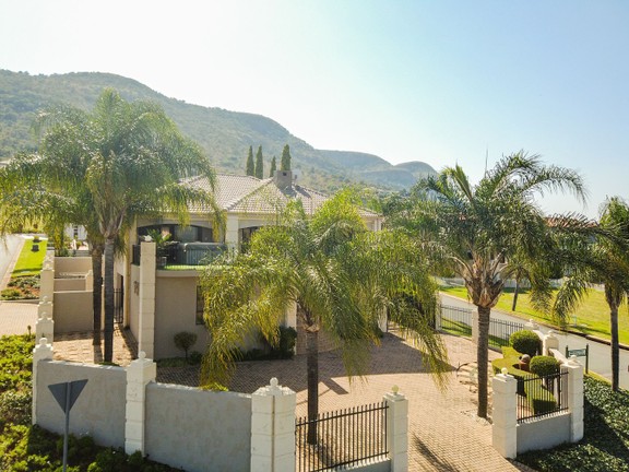 Outside view of the property and the mountains at the background