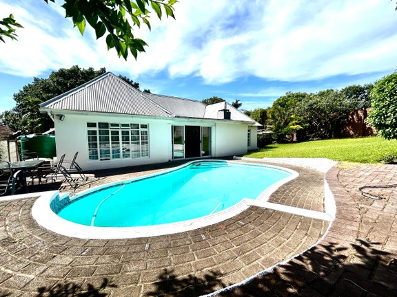 View of Property with Pool