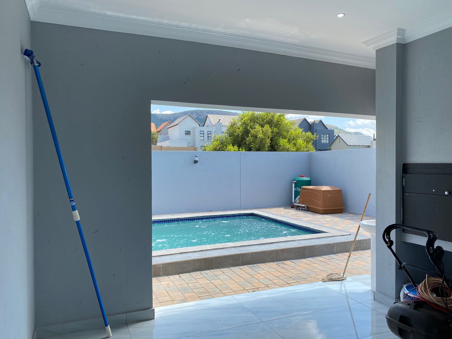 House in Leloko Lifestyle & Eco Estate - Covered patio with built-in braai opening up to pool area