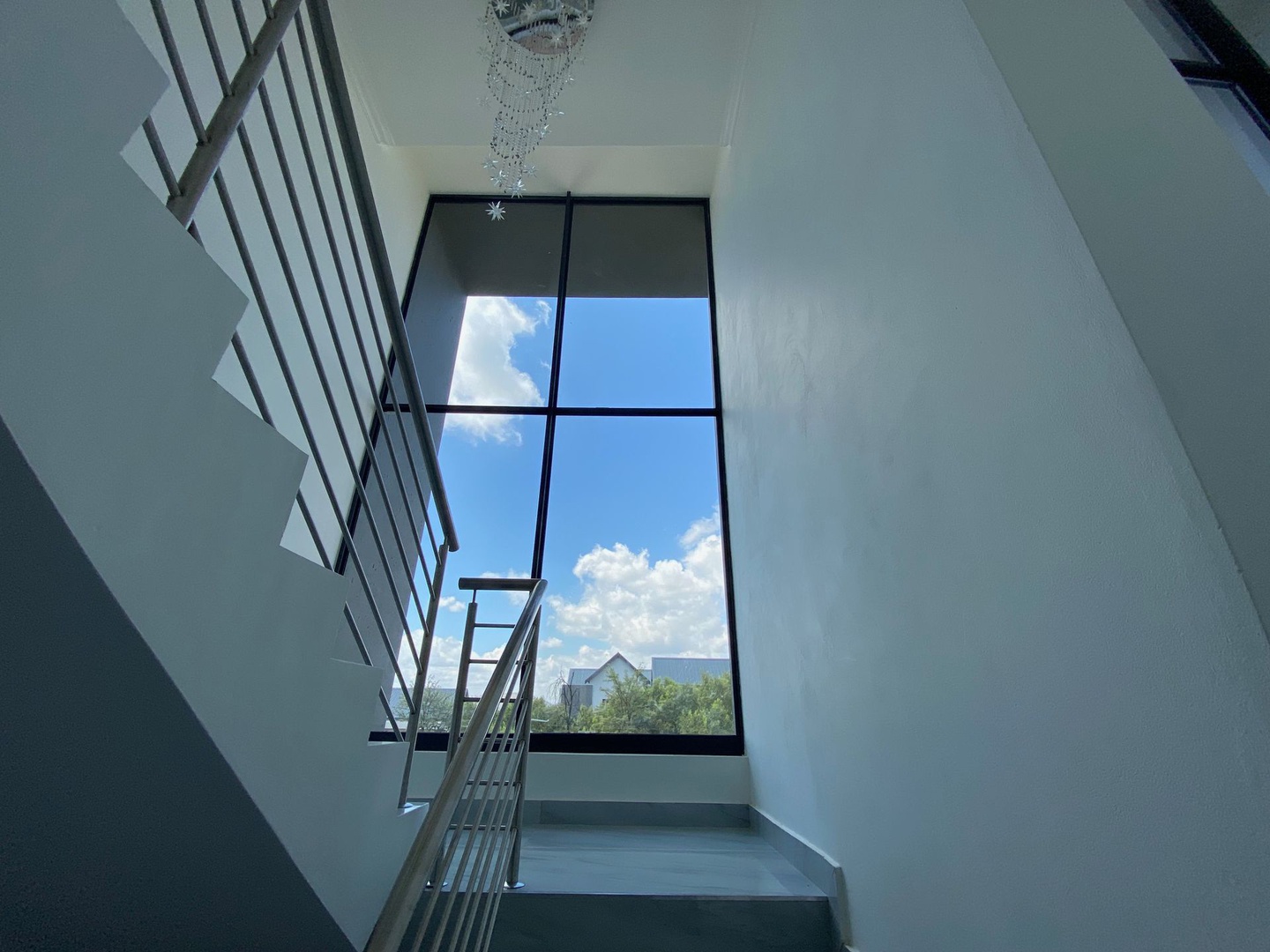 House in Leloko Lifestyle & Eco Estate - Large double volume windows provides natural light