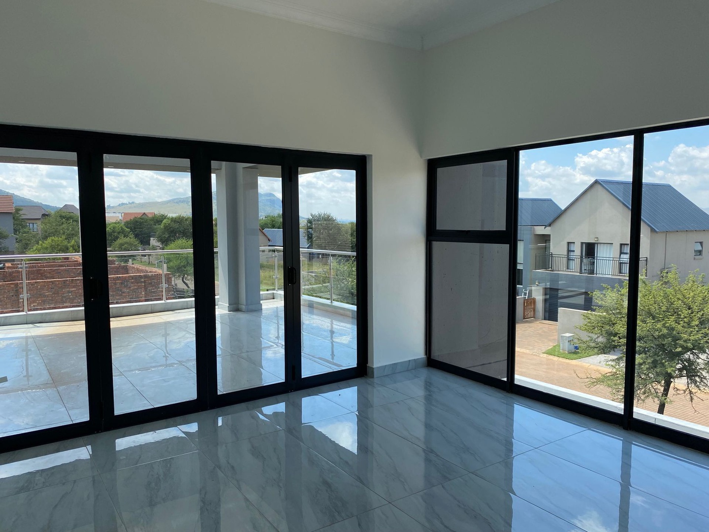 House in Leloko Lifestyle & Eco Estate - Upstairs entertainment area with covered patio and built-in braai