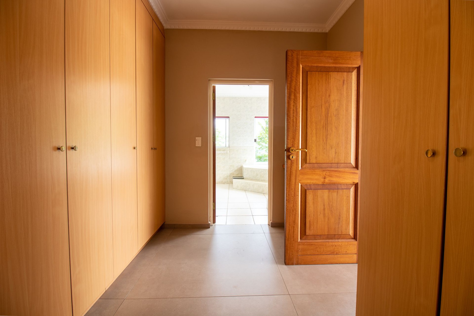 House in Kosmos - Walk in wardrobe area is part of the main bedroom suite